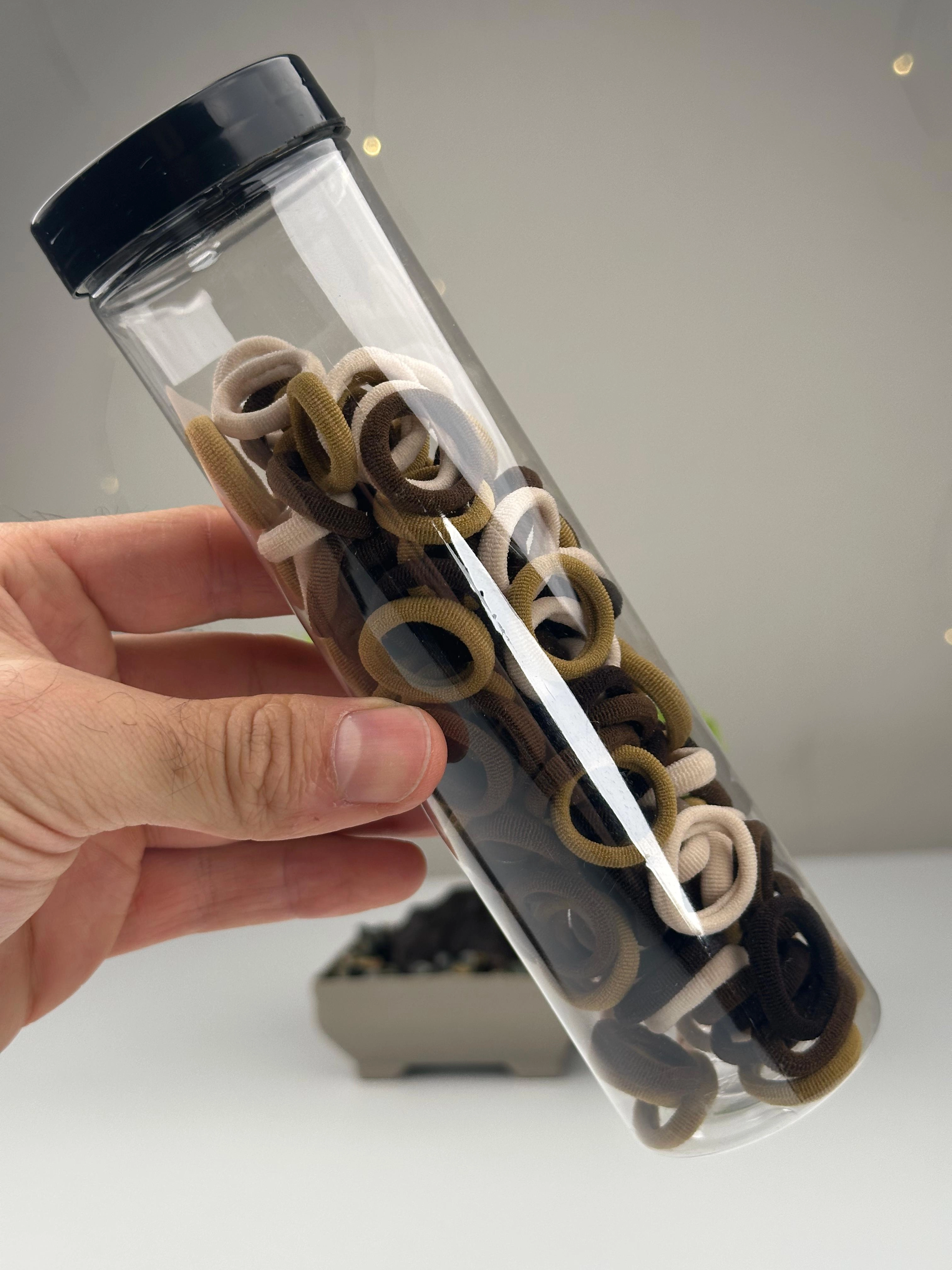 100’lü Sert Plastik Kutulu Lastik Toka 